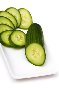 cucumber cut by rings on a white background
