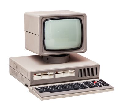 Old gray computer isolated on a white background