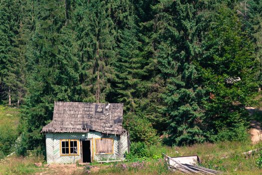 old wooden house in the Carpathian forest