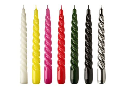 Group 7 twisted colored candles on a white background
