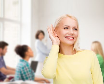 gossip, communication and people concept - smiling young woman listening to gossip