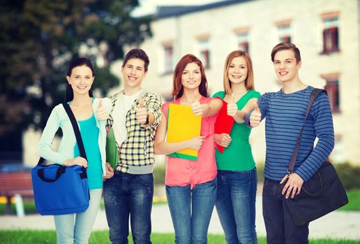 education and people concept - group of smiling students standing