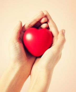 close up of woman hands with heart