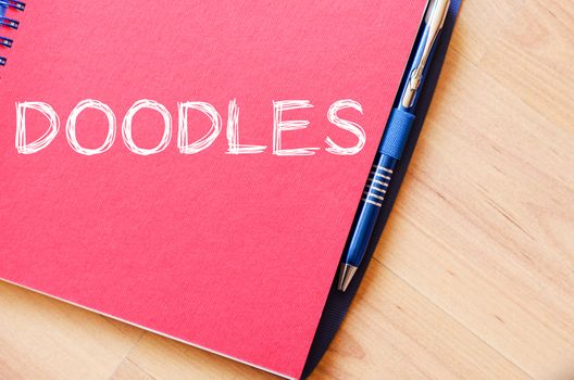 Doodles text concept write on notebook