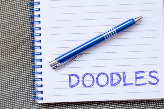 Doodles text concept write on notebook