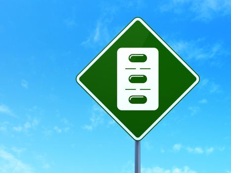 Healthcare concept: Pills Blister on green road (highway) sign, clear blue sky background, 3d render