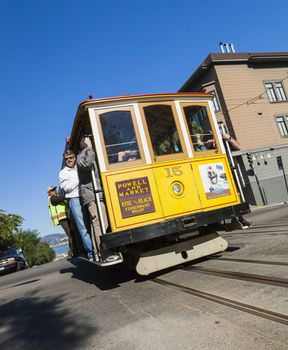 San Francisco, USA - November 3, 2012: The Cable car tram. The San Francisco cable car system is world last permanently manually operated cable car system. Lines were established betw. 1873 and 1890.