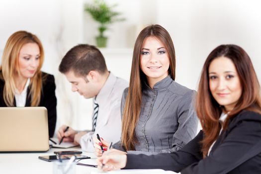 Happy young Businesswoman in the office, Looking at camera.