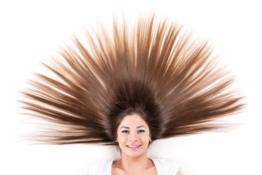 Cute young girl with Beautiful healthy shiny hair.