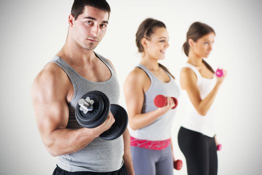 Group of people exercising and lifting the weights with biceps exercise.