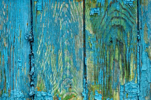 Exfoliated blue paint on wood as background