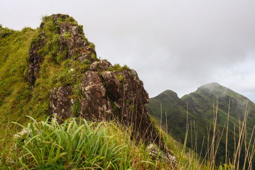 Trail for cliff to peak in the forest of  Khao Chang Puak mountain at the Thong Pha Phum National Park, Thailand.