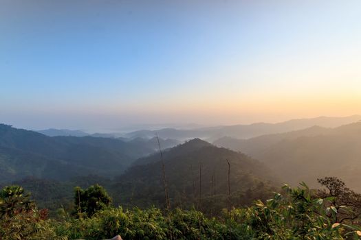 Beautiful sunrise in the hills rain forests, Thailand.