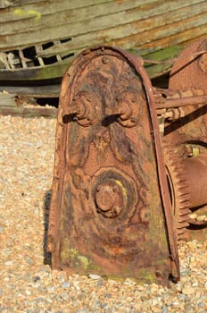 Old rusty metal gears at seaside