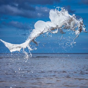 White watercolour splash on sea background