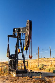 Working oil pump in Nevada desert,  America