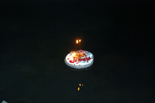 PAKISTAN, Karachi :  Married Hindu women and their husband light candles at the Netty Jetty temple during the Karva Chauth festival in Karachi on October 30, 2015. Married women observe Karvachauth by fasting and offering prayers seeking welfare, prosperity, and longevity of their husbands.
