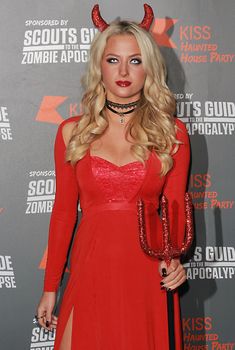 ENGLAND, London: Chloe Paige attended the Kiss FM Haunted House Party in London on October 29, 2015. Costumes ranging from the Rock band KISS to the devil were on display as various stars walked the red carpet at the party which featured musical performances by Rita Ora, Jason Derulo and band Little Mix.
