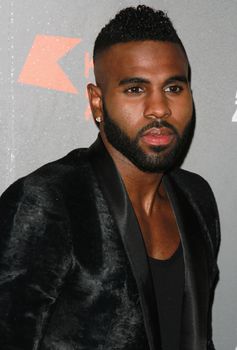 ENGLAND, London: Jason Derulo attended the Kiss FM Haunted House Party in London on October 29, 2015. Costumes ranging from the Rock band KISS to the devil were on display as various stars walked the red carpet at the party which featured musical performances by Rita Ora, Jason Derulo and band Little Mix.