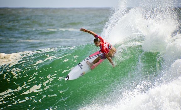 SNAPPER ROCKS, GOLD COAST, AUSTRALIA -FEB 26: Unidentified Surfer walk into the water to races on the Quiksilver & Roxy Pro World Title Event. February 26, 2012, Snapper Rocks, Gold Coast, Australia