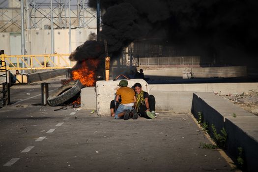 WEST BANK, Erez Crossing: Israeli troops clashed with Palestinian protesters near the Erez Crossing on October 30, 2015. As many as 46 Palestinians were injured in the unrest, including 17 by live fire. 