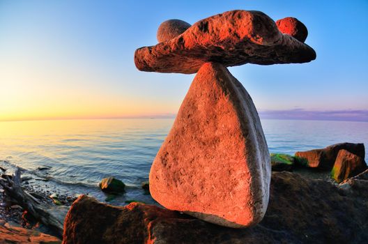 Stones at the seashore in sunrise time