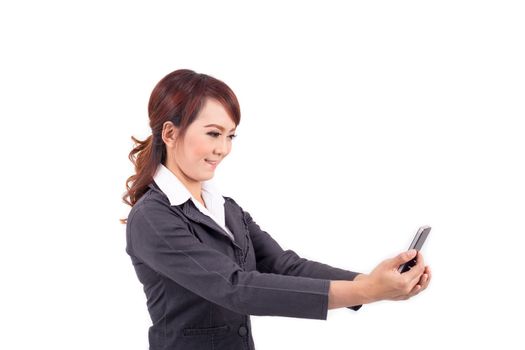 Young business woman holding cellphone on white background