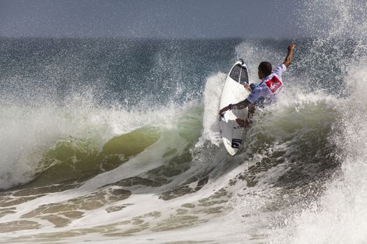 SNAPPER ROCKS, GOLD COAST, AUSTRALIA - FEB 26: Unidentified Surfer races the Quiksilver & Roxy Pro World Title Event. February 26, 2012, Snapper Rocks, Gold Coast, Australia