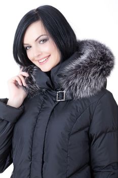 Young attractive woman in fashionable clothing on isolated background