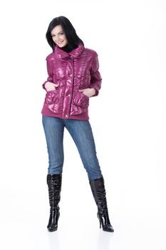 Young attractive woman in fashionable clothing on isolated background