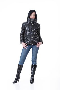 Young attractive woman in fashionable clothing on isolated background