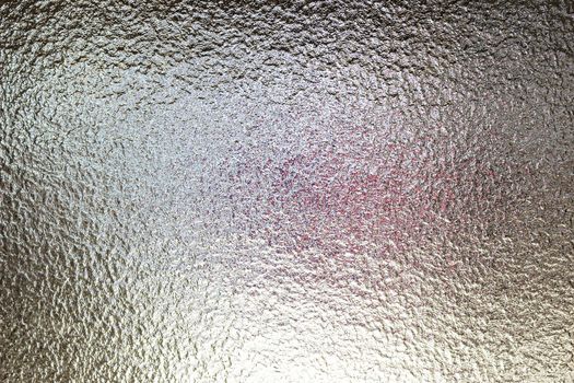 Frosted glass texture. colorful lights background