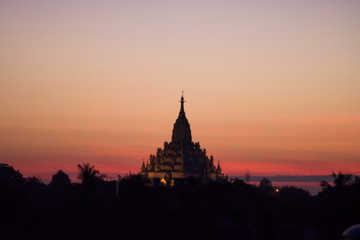 Silhouette of the Swal Daw Pagoda in Yangon, Myanmar after sunset.