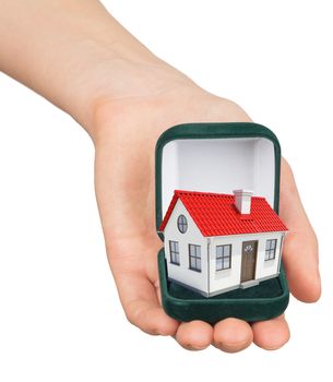 Empty ring box house in womans hand on isolated white background