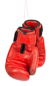 Red boxing gloves on isolated white background