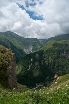 Mountains landscape with green hills and sky for travel and hiking