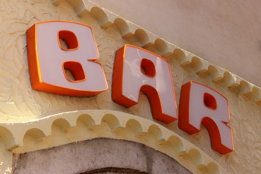 Bar Sign. White and Orange Plastic 3D Letters