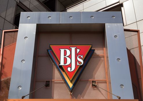 GLENDALE, CA/USA - OCTOBER 24, 2015:  BJ's Restaurant Brewhouse Sign. BJ’s Restaurants, Inc. currently owns and operates 148 casual dining restaurants under the name BJ's Restaurant & Brewery.