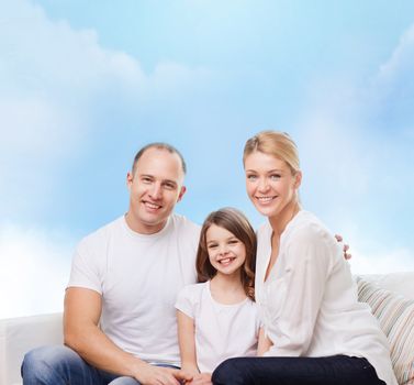 family, childhood and people - smiling mother, father and little girl over blue sky background