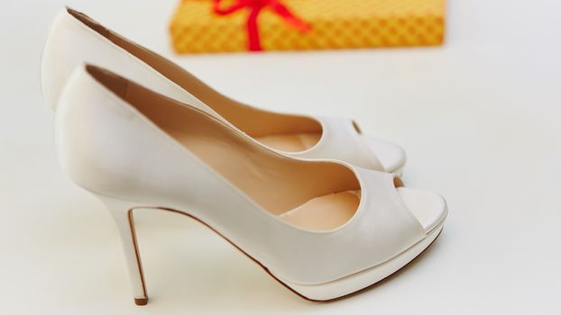 The white wedding shoes for women. Shallow dof