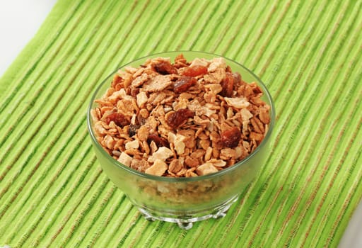 Bowl of mixed breakfast cereals and dried fruit