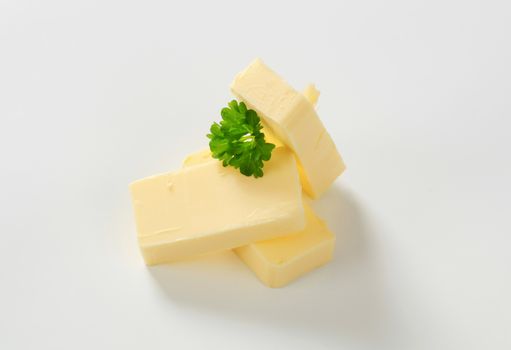 Pieces of fresh butter  - studio shot