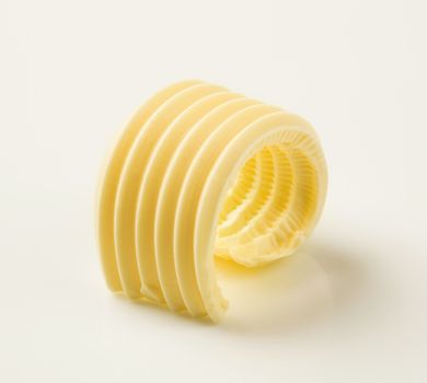 Studio shot of a curl of fresh butter
