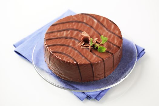 Delicious cake glazed with chocolate icing  - studio