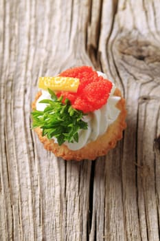Tart pastry with savory spread topping - detail