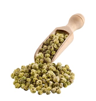 Green peppercorns in wooden scoop