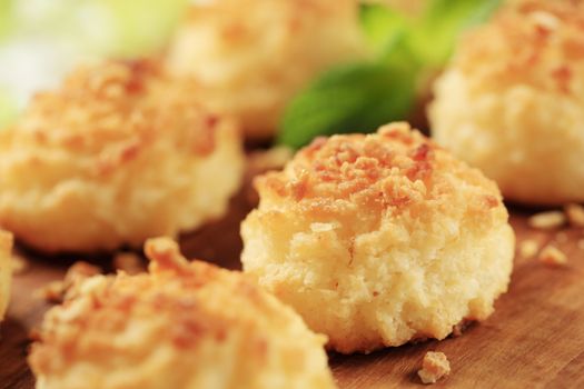 Coconut macaroons on a cutting board - detail