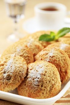 Rows of crispy cookies in styrofoam container