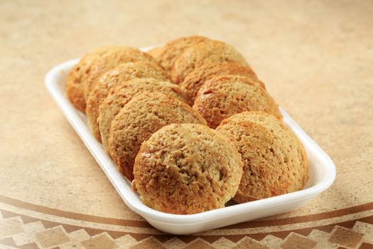 Crispy cookies in styrofoam tray