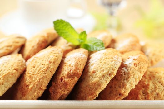 Rows of crispy cookies in styrofoam container